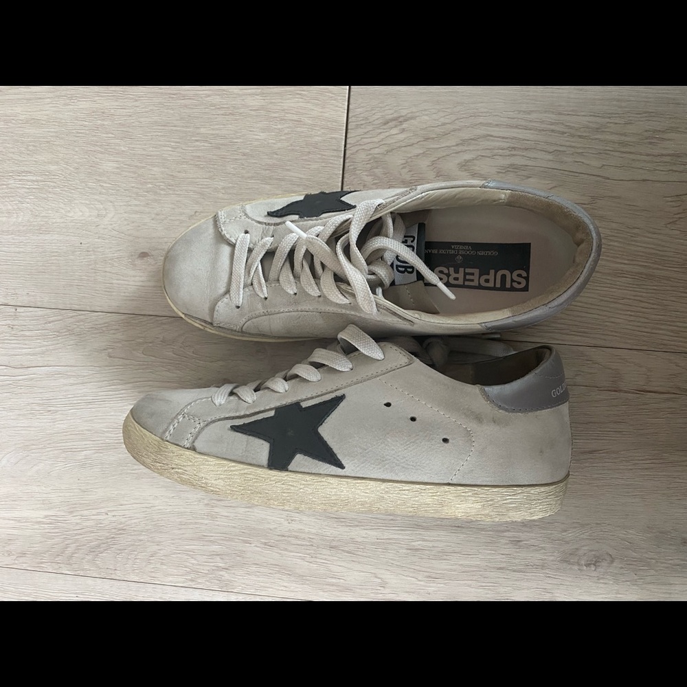 Golden goose superstar sneakers.